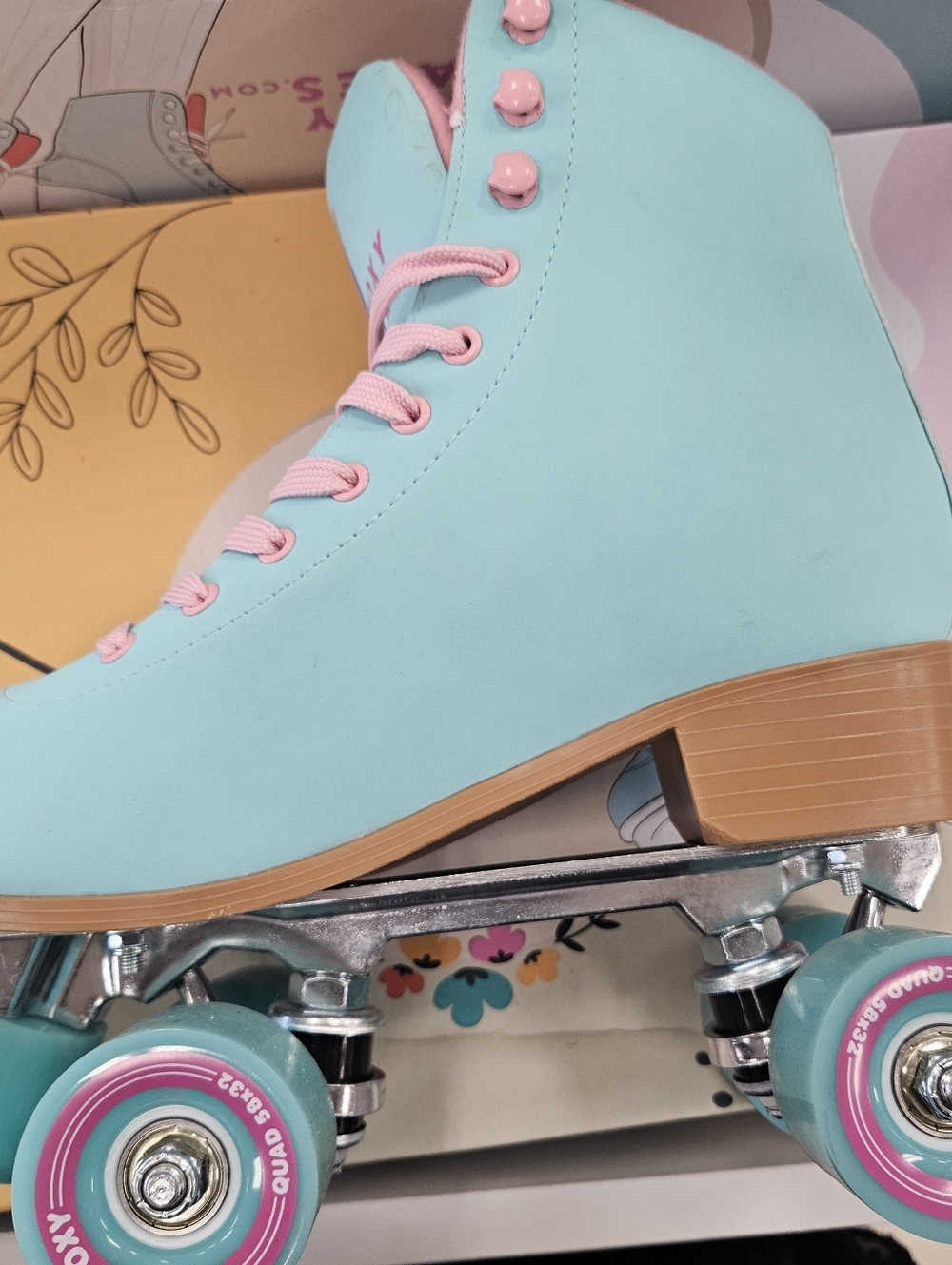 Light Blue Roller Skate with Pink Accents